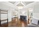 Spacious foyer with hardwood floors and beautiful light fixtures, leading into the main living areas of the home at 2652 Brickell Sq, Atlanta, GA 30341