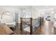 Spacious hallway with wooden floors, access to multiple rooms, and a staircase at 2652 Brickell Sq, Atlanta, GA 30341