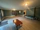 Spacious living room with neutral paint, light flooring, and plenty of room for entertaining at 661 Oak Dr, Riverdale, GA 30274