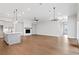 Spacious living room featuring open layout, hardwood floors, and modern fireplace at 91 Batten Board Way, Woodstock, GA 30189