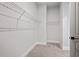 Walk-in closet with wall to wall wire shelving at 91 Batten Board Way, Woodstock, GA 30189