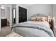 Bedroom featuring a comfortable bed, ample storage, and convenient access to a full bathroom at 1365 Memorial Se Dr # 12, Atlanta, GA 30317