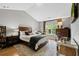Comfortable bedroom with hardwood floors, natural light, and decorative furnishing at 1365 Memorial Se Dr # 12, Atlanta, GA 30317