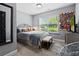 Cozy bedroom with a comfortable bed, ample natural light, and stylish decor at 1365 Memorial Se Dr # 12, Atlanta, GA 30317