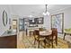 Open concept dining room view showcasing a table for four with a nearby modern kitchen at 1365 Memorial Se Dr # 12, Atlanta, GA 30317