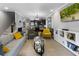 Open-concept living space with a view of the kitchen, dining area, and staircase at 1365 Memorial Se Dr # 12, Atlanta, GA 30317