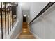 Staircase leading to the lower level with wood steps and iron railing at 1365 Memorial Se Dr # 12, Atlanta, GA 30317