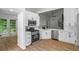 Modern kitchen featuring stainless steel appliances, sleek white cabinetry, and stylish countertops at 1909 Riverlanding Cir, Lawrenceville, GA 30046