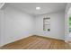 This versatile room features wood-look flooring, offering a bright and adaptable space for various needs at 1909 Riverlanding Cir, Lawrenceville, GA 30046