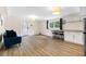 Bright basement with a small kitchenette, breakfast bar, and a cozy seating area at 4265 Hidden Valley Dr, South Fulton, GA 30349