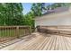 Wooden deck with railing, offering a serene outdoor space at 4265 Hidden Valley Dr, South Fulton, GA 30349