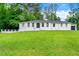 Charming home with a well-manicured lawn and inviting curb appeal at 4265 Hidden Valley Dr, South Fulton, GA 30349