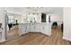 Bright kitchen with marble countertop island and an open view to other living areas at 4265 Hidden Valley Dr, South Fulton, GA 30349
