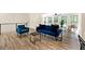Spacious living room featuring modern decor, lots of natural light and an open floor plan at 4265 Hidden Valley Dr, South Fulton, GA 30349