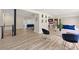Stylish living room with hardwood floors and decor leading to kitchen and other rooms at 4265 Hidden Valley Dr, South Fulton, GA 30349