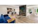 Open concept living area with a sleek fireplace and kitchen views at 4265 Hidden Valley Dr, South Fulton, GA 30349