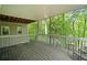 Large screened deck overlooks the wooded backyard at 4365 Dover Crossing Dr, Marietta, GA 30066