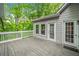 Large wooden deck with white railings offering space for outdoor entertaining at 4365 Dover Crossing Dr, Marietta, GA 30066