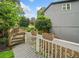 View from deck of lush backyard landscaping and serene surroundings at 4365 Dover Crossing Dr, Marietta, GA 30066