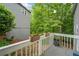 View from deck of wooded backyard with plants and trees at 4365 Dover Crossing Dr, Marietta, GA 30066