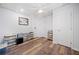 Finished basement area with drop ceiling and wood-look flooring at 4365 Dover Crossing Dr, Marietta, GA 30066