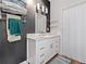 Stylish bathroom featuring a white vanity with marble countertop and modern lighting at 4365 Dover Crossing Dr, Marietta, GA 30066