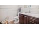 Cozy half-bath featuring a modern vanity and wood-look flooring at 4365 Dover Crossing Dr, Marietta, GA 30066