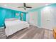 Bright primary bedroom features a large window, ceiling fan and closet space at 4365 Dover Crossing Dr, Marietta, GA 30066