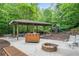 Outdoor pavilion with grill and firepit, perfect for gatherings and entertaining at 4365 Dover Crossing Dr, Marietta, GA 30066
