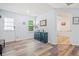 Light-filled entryway boasts lovely wood-look floors and a decorative console table at 4365 Dover Crossing Dr, Marietta, GA 30066