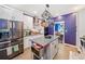 Well-appointed kitchen boasts stainless steel appliances, a kitchen island, and ample counter space at 4365 Dover Crossing Dr, Marietta, GA 30066