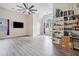 Bright living room with vaulted ceilings, large windows, and modern fan at 4365 Dover Crossing Dr, Marietta, GA 30066