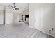 Bright living room with hardwood floors, high ceilings, and a modern ceiling fan at 4365 Dover Crossing Dr, Marietta, GA 30066