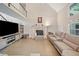 Spacious living room with vaulted ceiling, fireplace, hardwood floors, and loft overlook at 4365 Dover Crossing Dr, Marietta, GA 30066