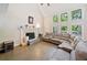 Bright living room with vaulted ceiling, fireplace, hardwood floors, and large windows at 4365 Dover Crossing Dr, Marietta, GA 30066