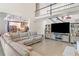 Bright, open-concept living room with hardwood floors connecting to the kitchen at 4365 Dover Crossing Dr, Marietta, GA 30066