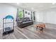 Cozy living room featuring modern furniture and wood-look flooring at 4365 Dover Crossing Dr, Marietta, GA 30066