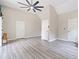 Spacious living room with multiple doors and wood-look floors at 4365 Dover Crossing Dr, Marietta, GA 30066