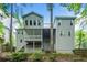 Rear exterior view featuring multiple decks and backyard landscaping at 4365 Dover Crossing Dr, Marietta, GA 30066