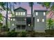 Rear view of the house showcasing multiple decks and outdoor living spaces at 4365 Dover Crossing Dr, Marietta, GA 30066
