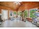 Cozy sunroom with wood-paneled walls, large windows, and pet-friendly amenities at 4365 Dover Crossing Dr, Marietta, GA 30066