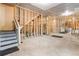 Unfinished basement awaiting personalization with framed walls ready for customization and storage at 6280 Stillwood Ln, Cumming, GA 30041