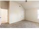 An empty bedroom with carpeted floors, and natural light from a bright window at 6280 Stillwood Ln, Cumming, GA 30041