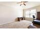 Office featuring carpeted floors, natural light, a ceiling fan, and office furniture at 6280 Stillwood Ln, Cumming, GA 30041