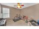 Bedroom includes workout equipment and a ceiling fan at 1332 Kent Mnr, Stockbridge, GA 30281