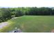 Expansive green community park features playground and soccer goals, surrounded by trees at 1332 Kent Mnr, Stockbridge, GA 30281