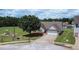 Exterior view of home near community park showing landscape, driveway and two car garage at 1332 Kent Mnr, Stockbridge, GA 30281
