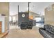 Open-concept living area flows into the kitchen and dining, featuring modern design at 1332 Kent Mnr, Stockbridge, GA 30281