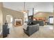 Spacious living room with a brick fireplace, vaulted ceilings, and an open layout to the kitchen at 1332 Kent Mnr, Stockbridge, GA 30281