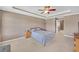 Main bedroom features ceiling fan and neutral decor at 1332 Kent Mnr, Stockbridge, GA 30281